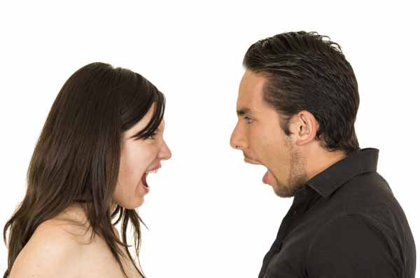 young attractive couple fighting screaming to each other
