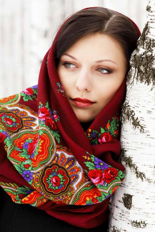 Beautiful Russian woman in national head cover