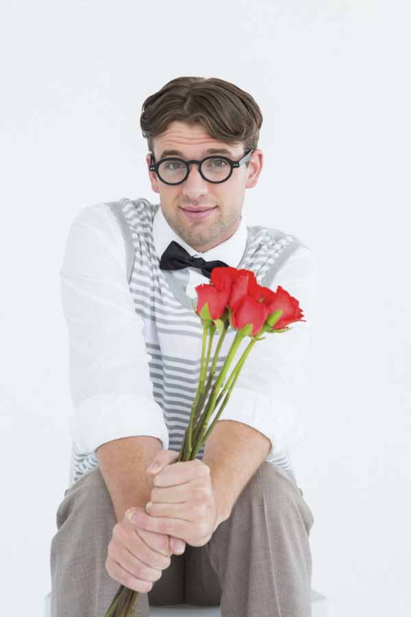 a nerd holding flowers