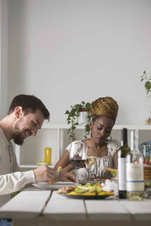 Young Multiracial Couple Enjoying Meal