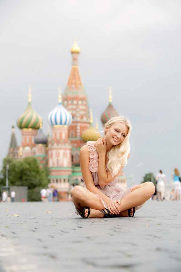 Charming blondeon Red Square in Moscow.