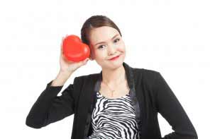 Asian business woman with red heart