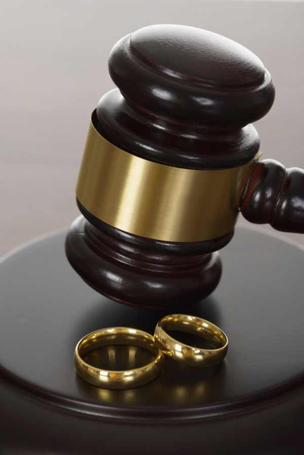 Wedding Rings And Wooden Gavel