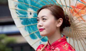 a beautiful Chinese woman in national red dress
