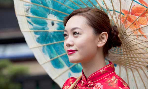 a beautiful Chinese woman in national red dress