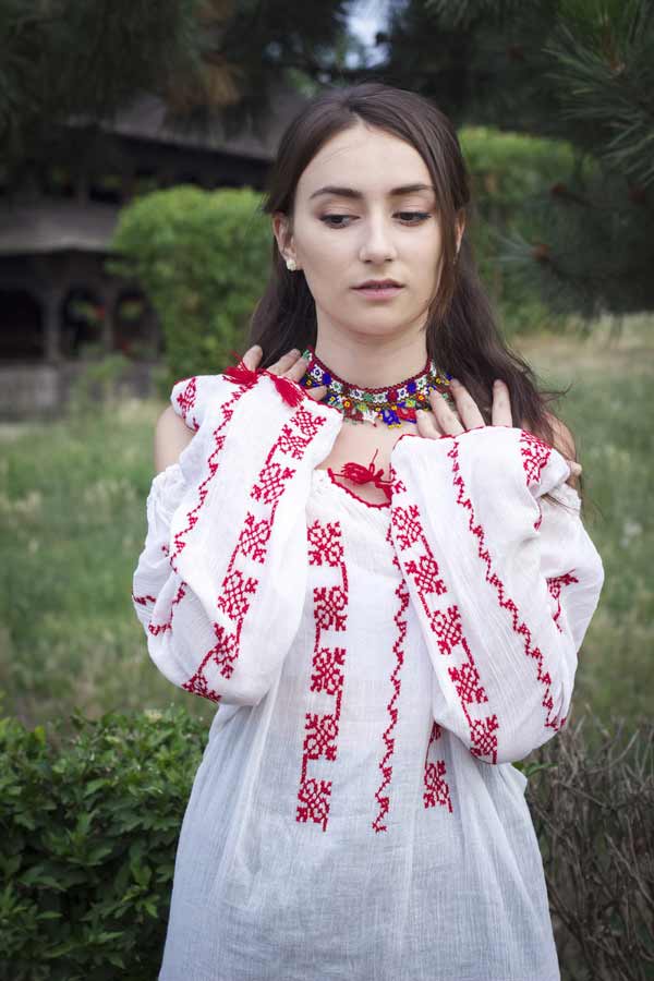 A young Romanian girl dressed traditionally