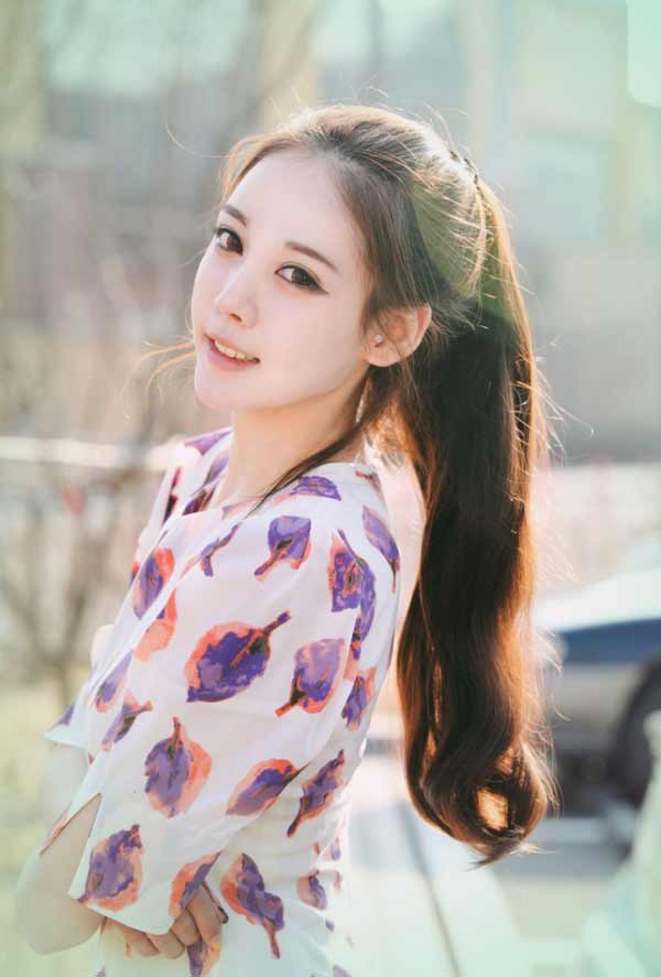 a beautiful Korean girl with pony tail 