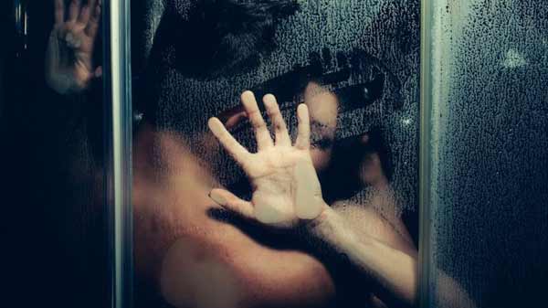 a passionate couple in a shower