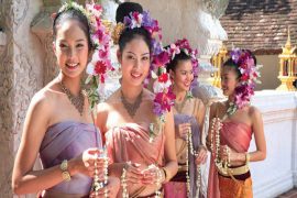 young thai women in traditional outfits