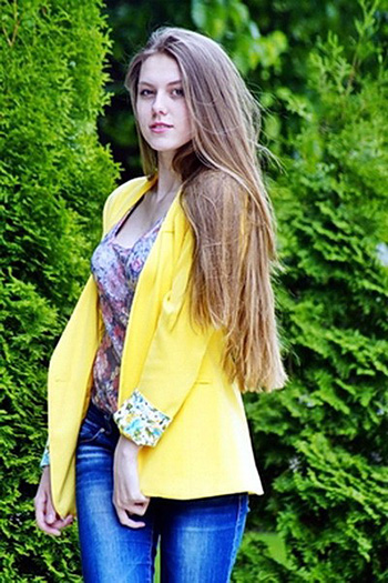 single Russian woman with long light brown hair 