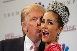Donald Trump kissing a model on stage